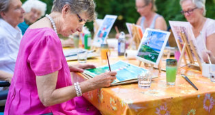 senior woman creating an art